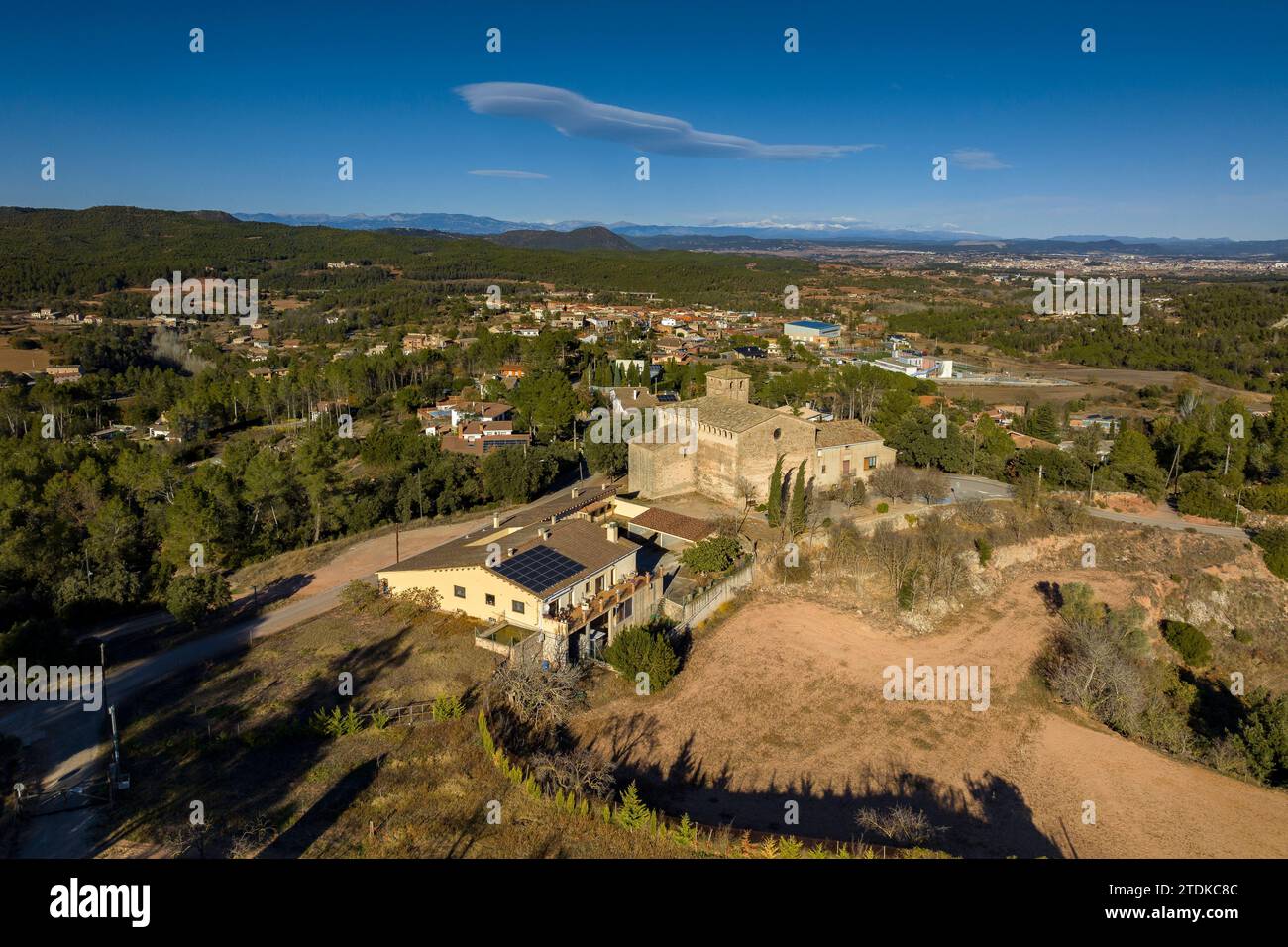 Aerial view of the church of Sant Salvador de Guardiola on a winter afternoon (Bages, Barcelona, Catalonia, Spain) Stock Photo