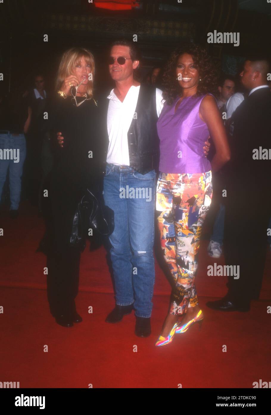 Los Angeles, California, USA 7th August 1996 Actress Goldie Hawn, Actor Kurt Russell and Actress Pam Grier attend Paramount Pictures Escape From LA Premiere at Mann Chinese Theatre on August 7, 1996 in Los Angeles, California, USA. Photo by Barry King/Alamy Stock Photo Stock Photo
