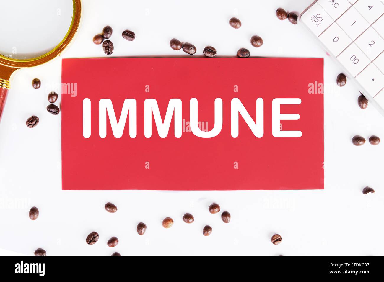 Immune writing on a red card on a white background with coffee beans ...