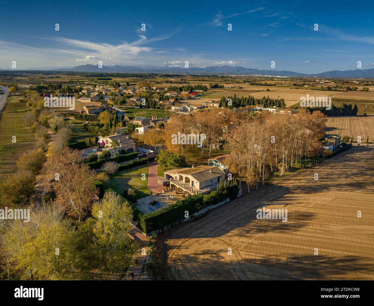 Aerial view of the village of Torroella de Fluvià on an autumn afternoon (Alt Empordà, Girona, Catalonia, Spain) Stock Photo