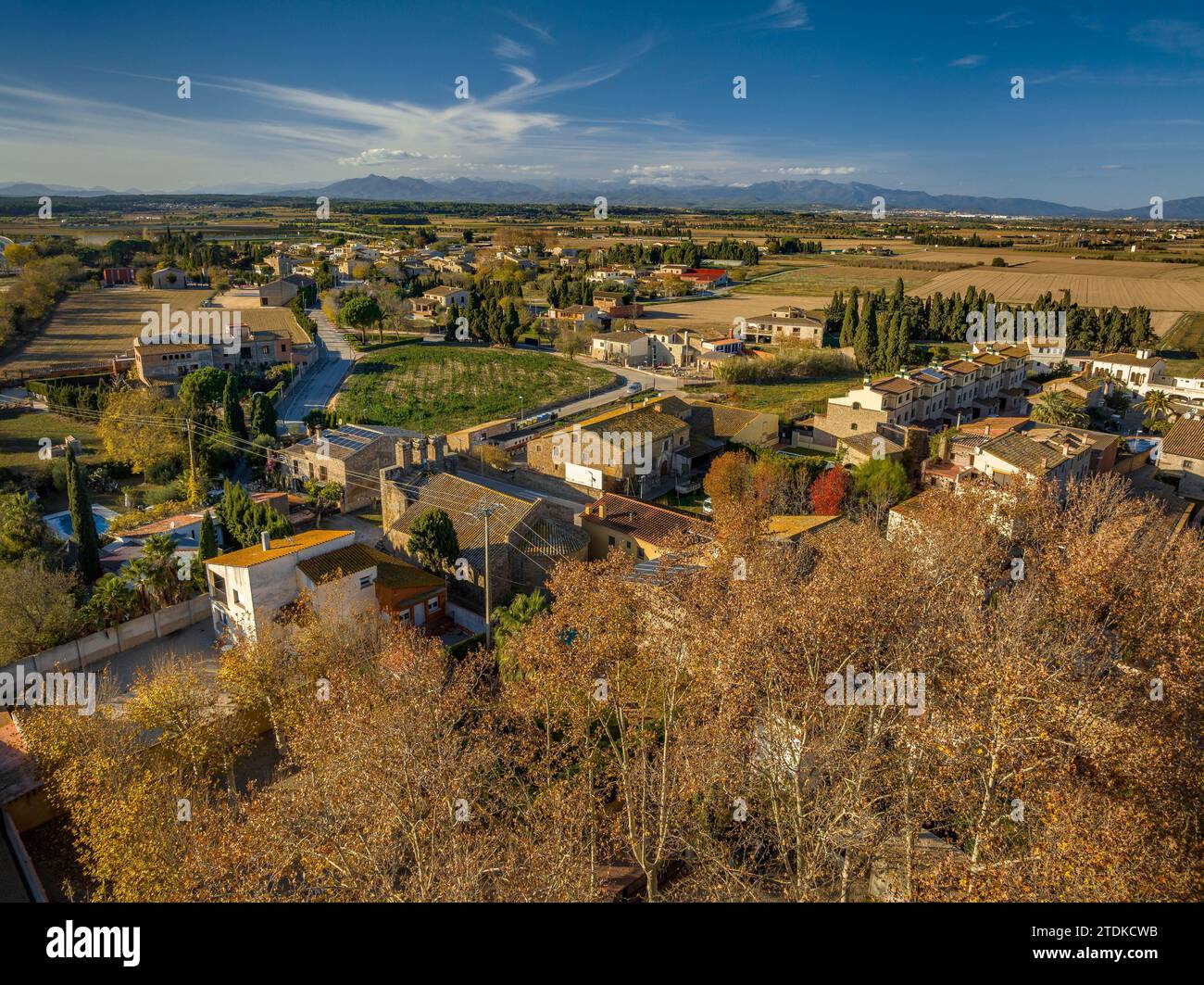 Aerial view of the village of Torroella de Fluvià on an autumn afternoon (Alt Empordà, Girona, Catalonia, Spain) Stock Photo