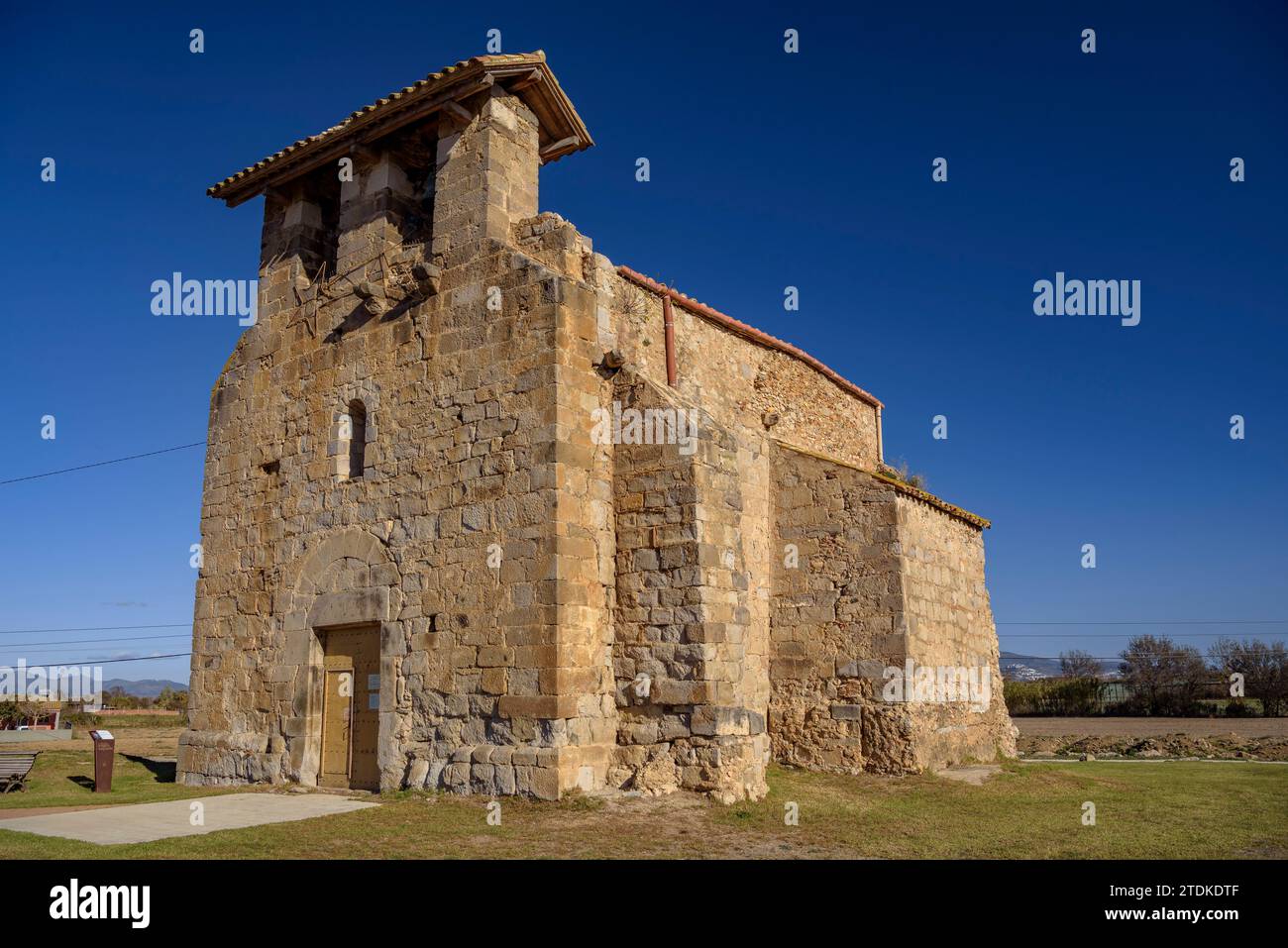 Church of Santa Maria de Vilamacolum on an autumn afternoon (Alt Empordà, Girona, Catalonia, Spain) ESP: Iglesia de Santa Maria de Vilamacolum en Stock Photo