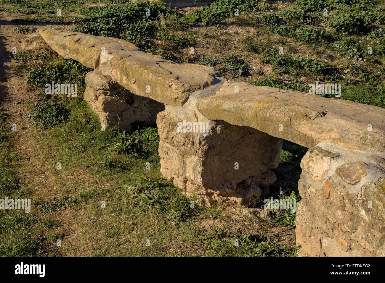 Old medieval stone bridge near Vilamacolum on an autumn afternoon (Alt Empordà, Girona, Catalonia, Spain) ESP: Antiguo puente de piedra medieval Stock Photo