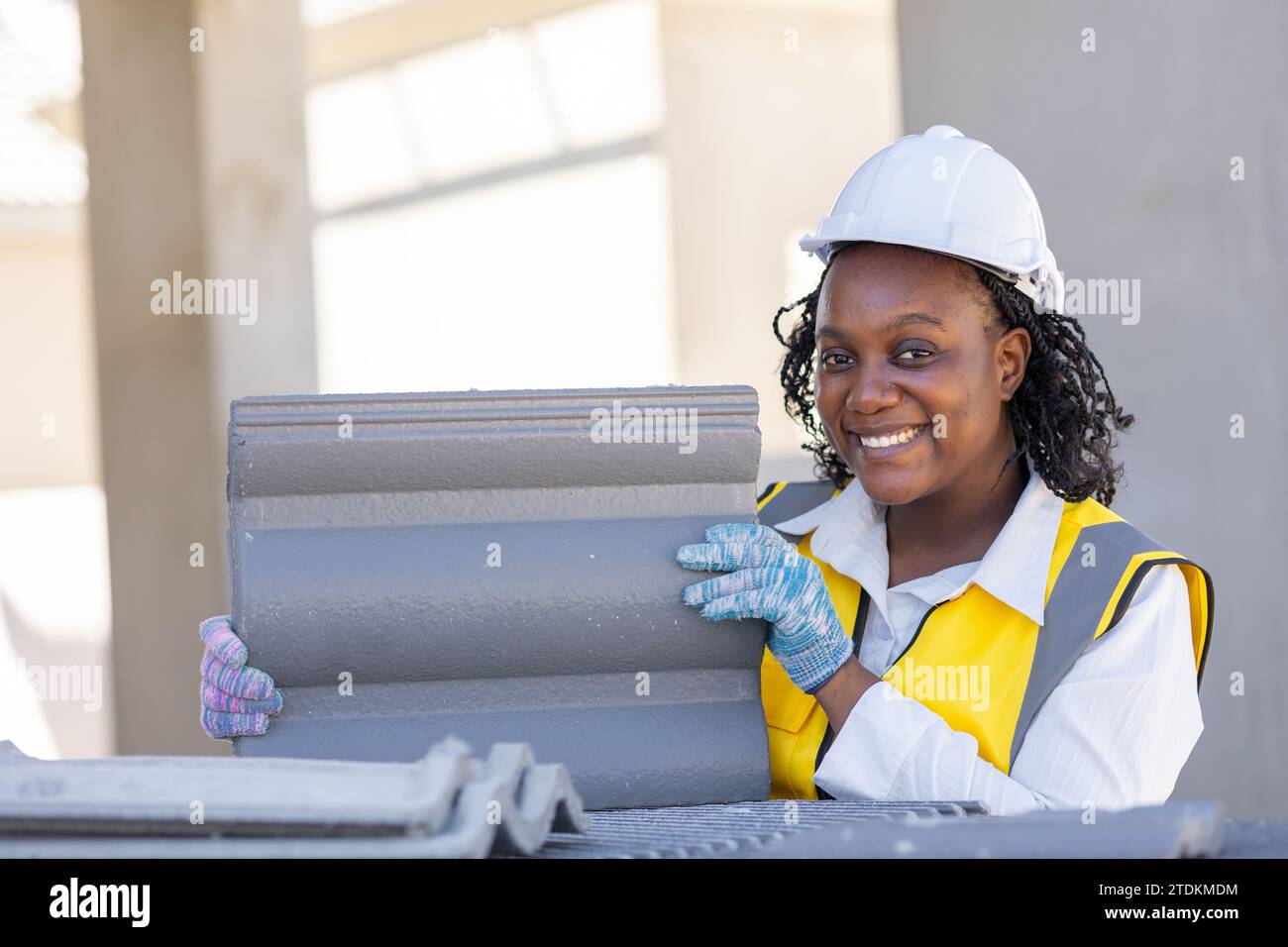 Portrait smart success black women worker african female work in construction industry happy smile in construction site. Stock Photo
