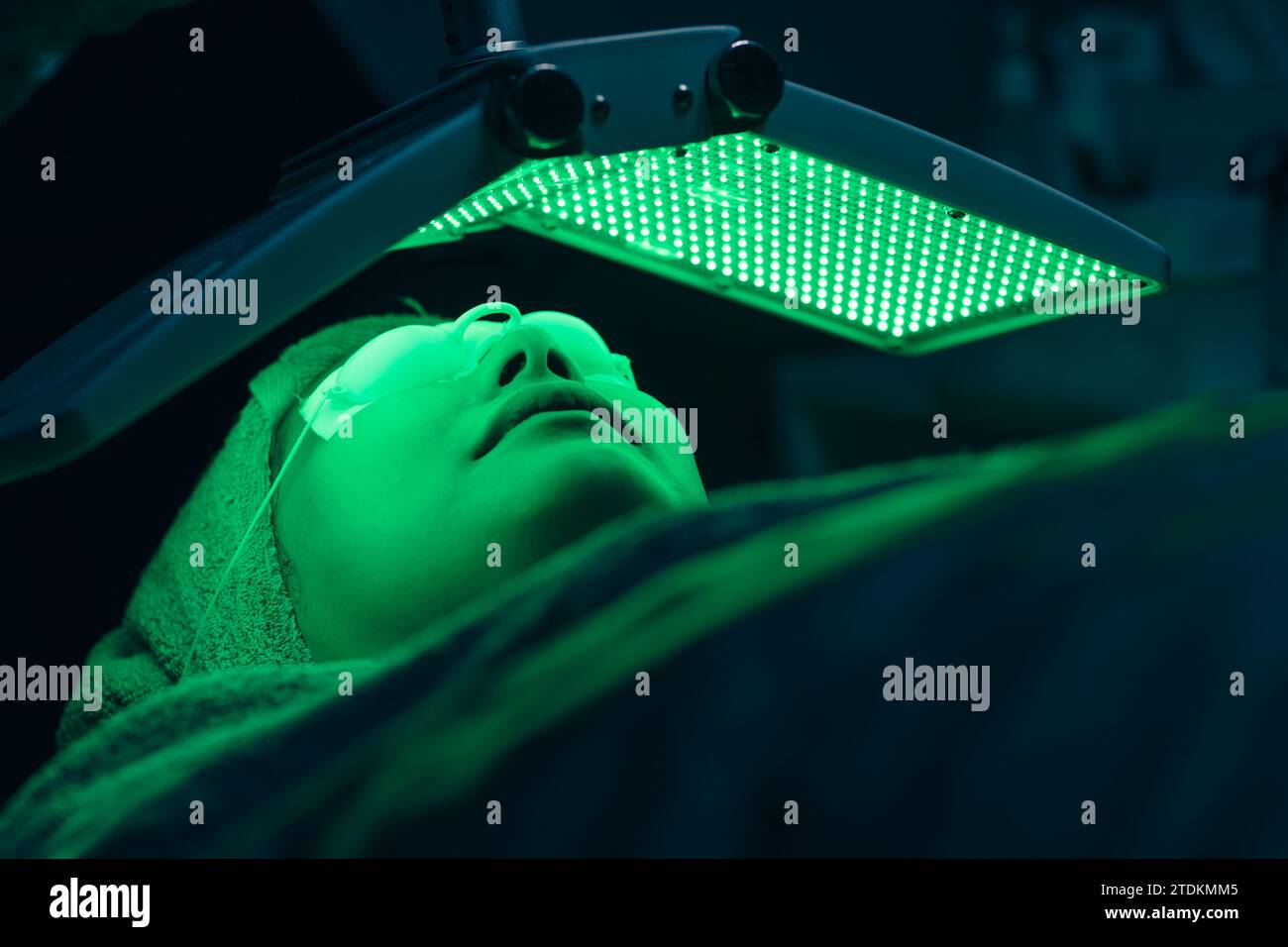 Woman facial cosmetic process with biolight LED laser face skin