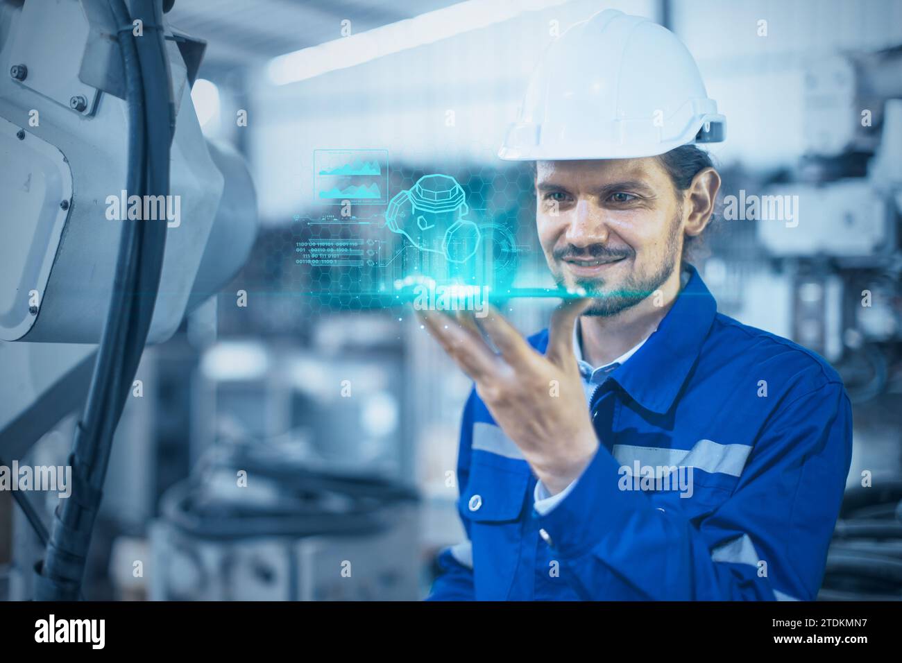Engineer male exciting with modern hologram display device showing engineering product model information detail using laser holographic 3d technology. Stock Photo