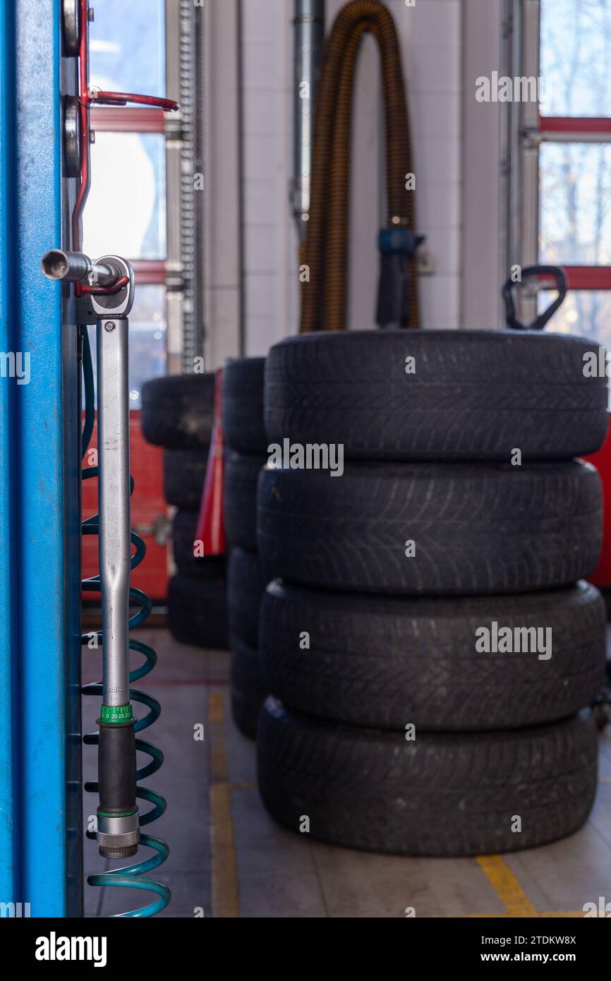 A set of tires for seasonal replacement near the lift in the tire ...