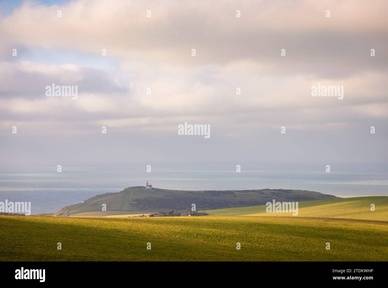 Calm peaceful midday view of Belle Tout lighthouse from Beachy Head on the south downs coast east Sussex south east England UK Stock Photo