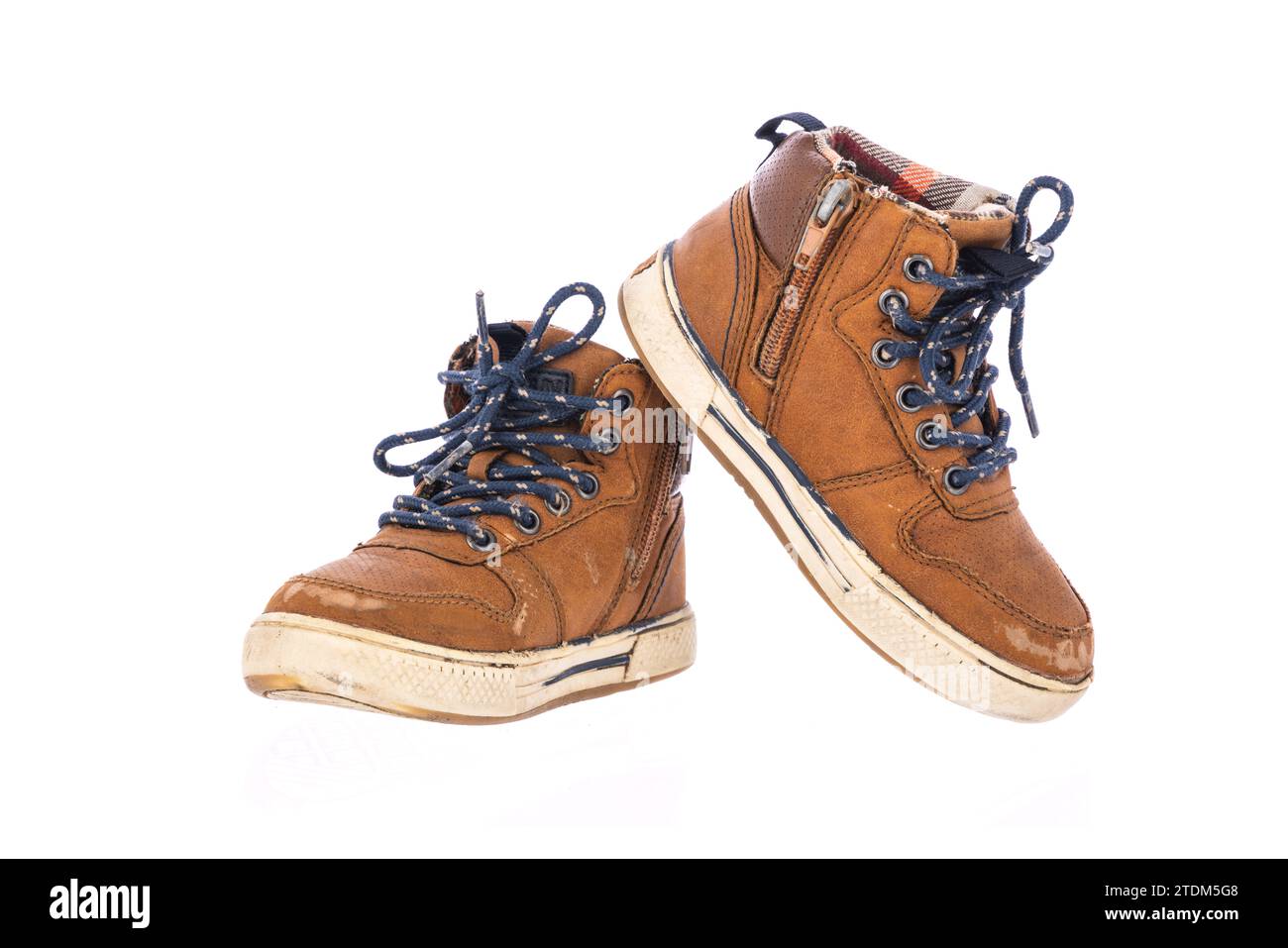 Old shoes on isolated white background Stock Photo
