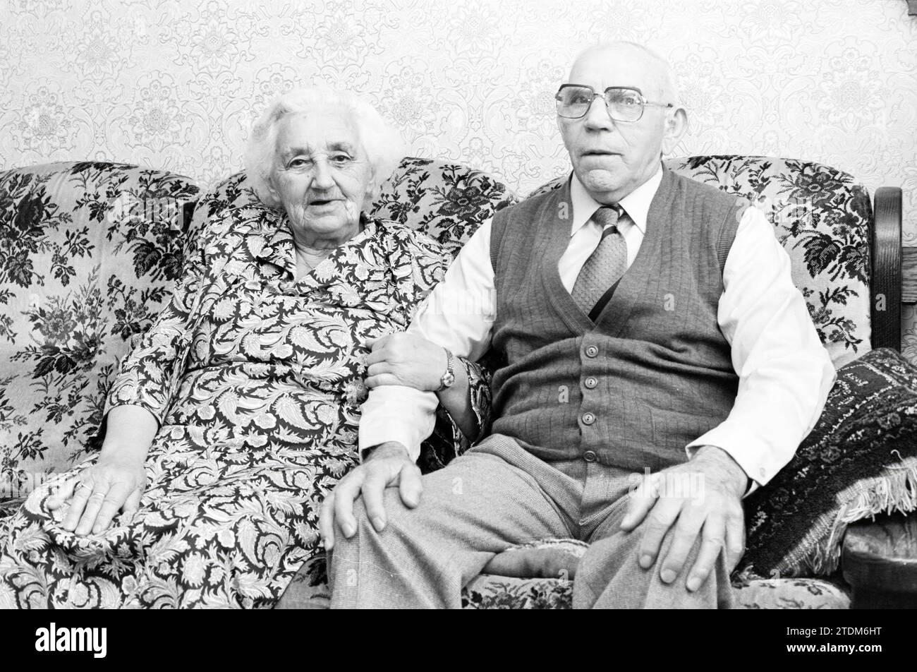 60 year old couple Sikkelerus, Beverwijk, Couples, Beverwijk, The Netherlands, 13-06-1983, Whizgle News from the Past, Tailored for the Future. Explore historical narratives, Dutch The Netherlands agency image with a modern perspective, bridging the gap between yesterday's events and tomorrow's insights. A timeless journey shaping the stories that shape our future Stock Photo