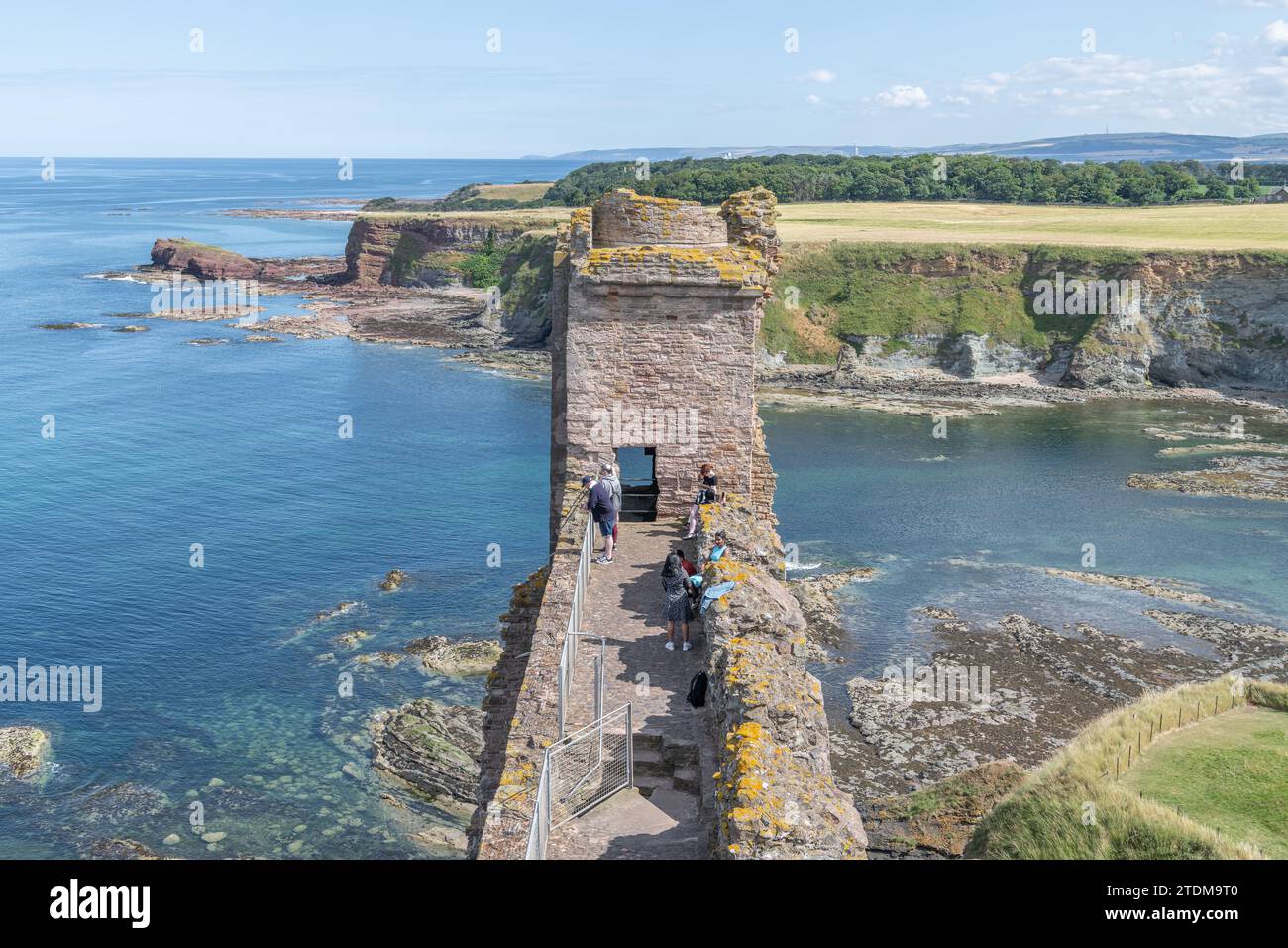 The south wall and Tower of Tantallon Castle with Seacliff beach in the