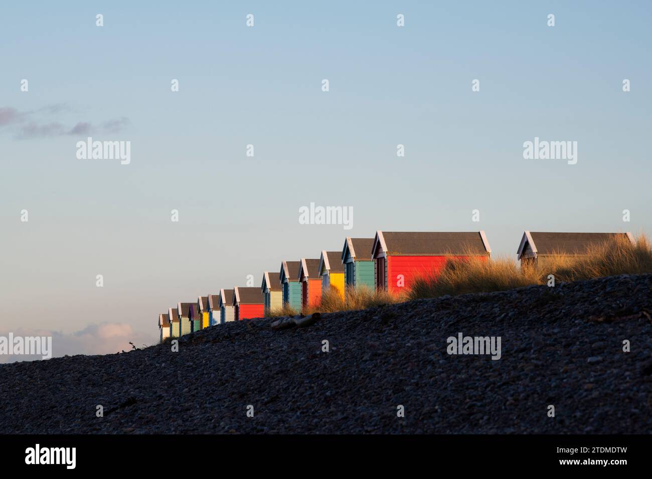 Painted beach huts on Findhorn beach. Morayshire, Scotland Stock Photo