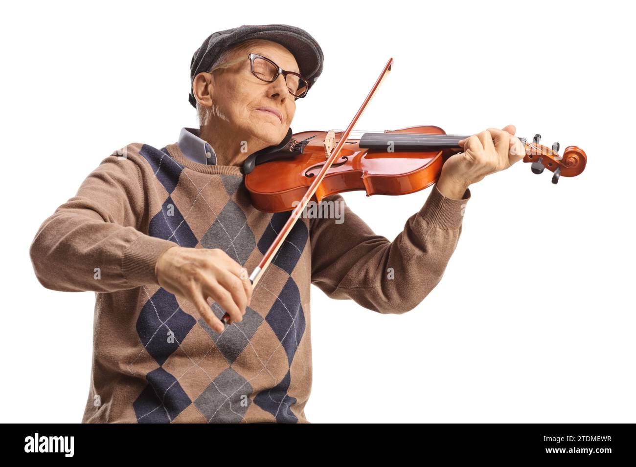 Pensioner playing a violin and enjoying the sounds isolated on white background Stock Photo