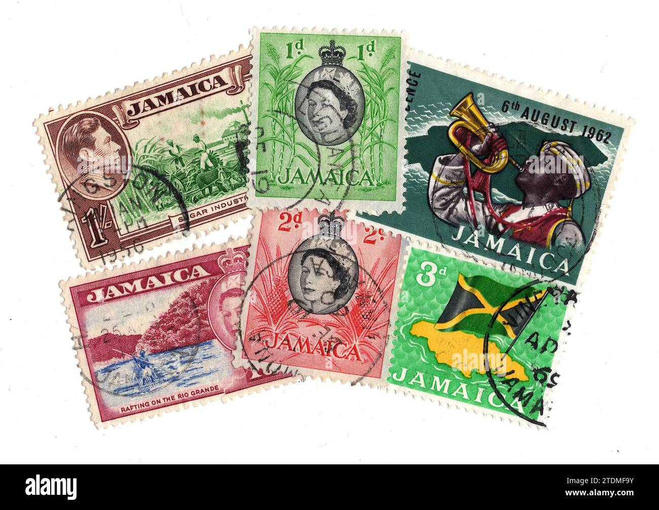 A Montage Of Vintage Postage Stamps From Jamaica On A White Background a-montage-of-vintage-postage-stamps-from-jamaica-on-a-white-background