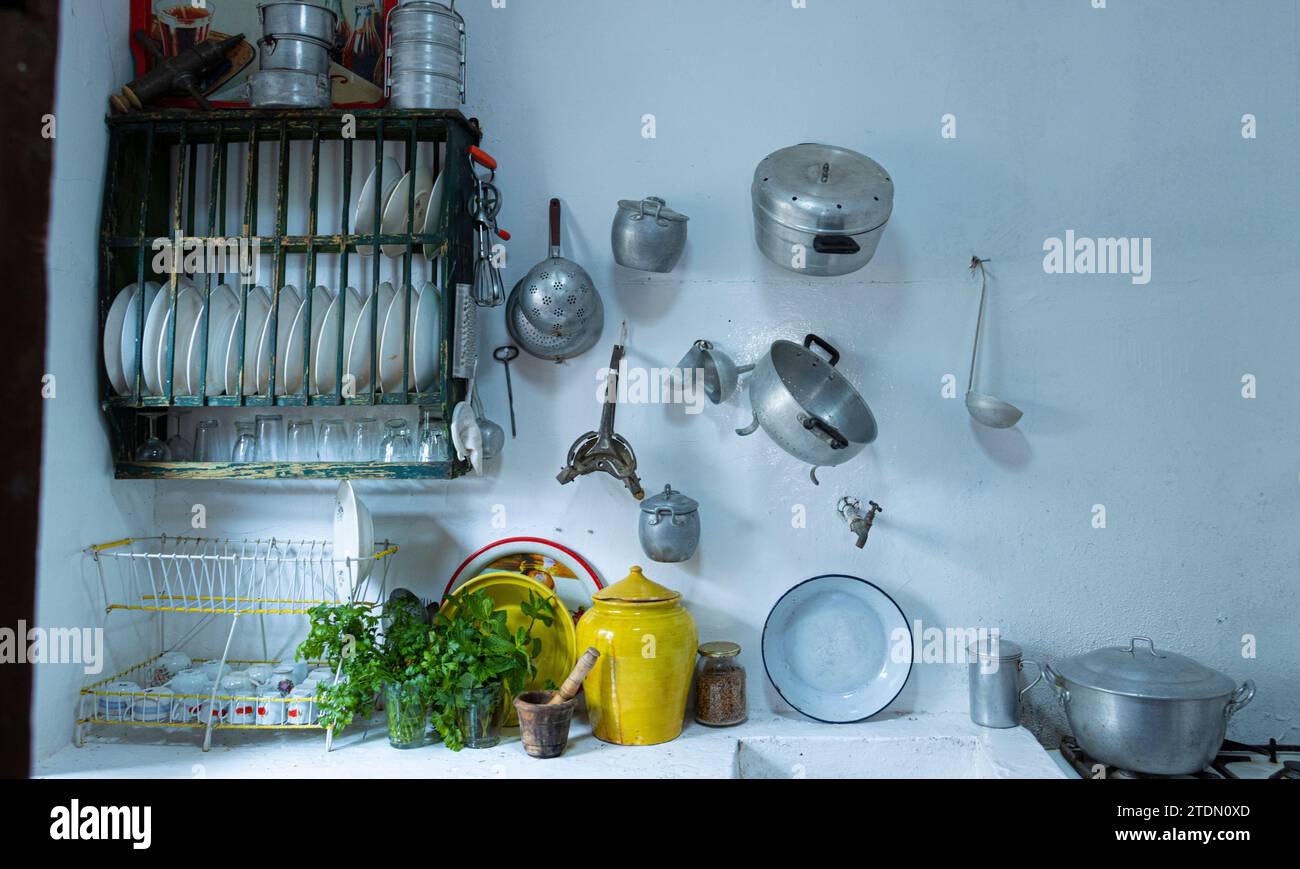 Old and traditional Canarian cuisine. Representation of the traditions of Chirche. Vintage pots and pans. Stock Photo