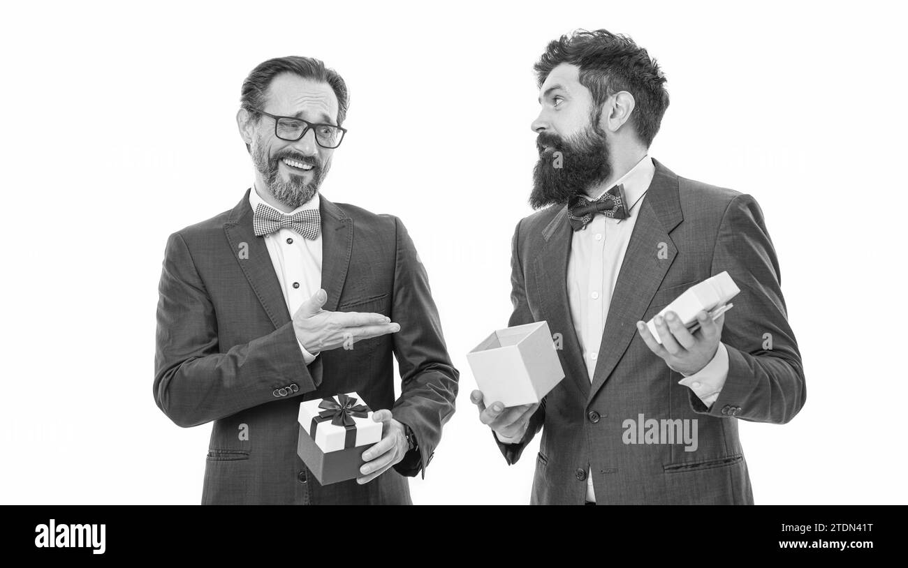 Choosing the best. businessmen in formal suit on party. business partners on meeting isolated on white. success and reward. esthete. bearded men hold Stock Photo
