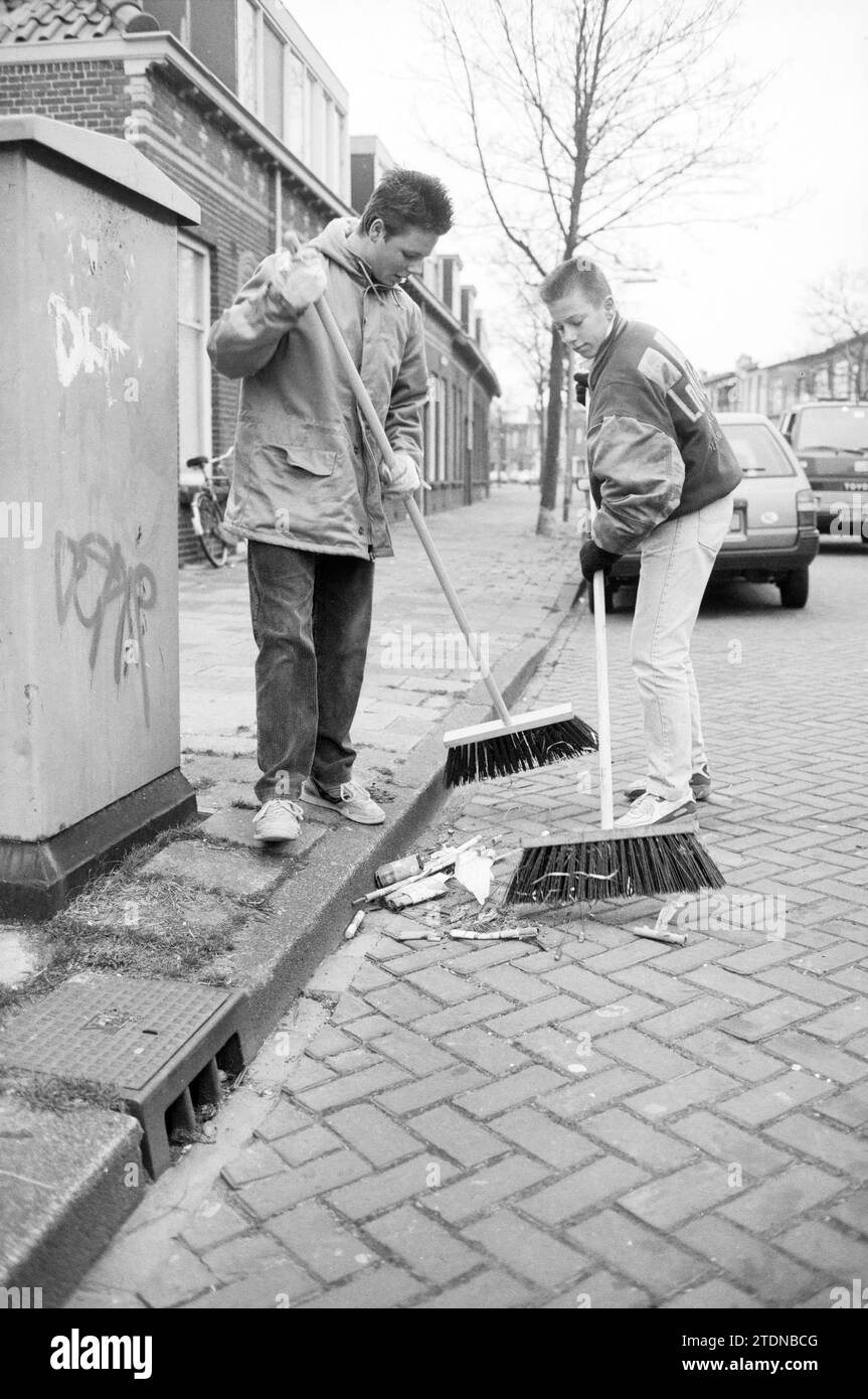 Street sweeping by two boys, Halt project, 02011992, Whizgle News