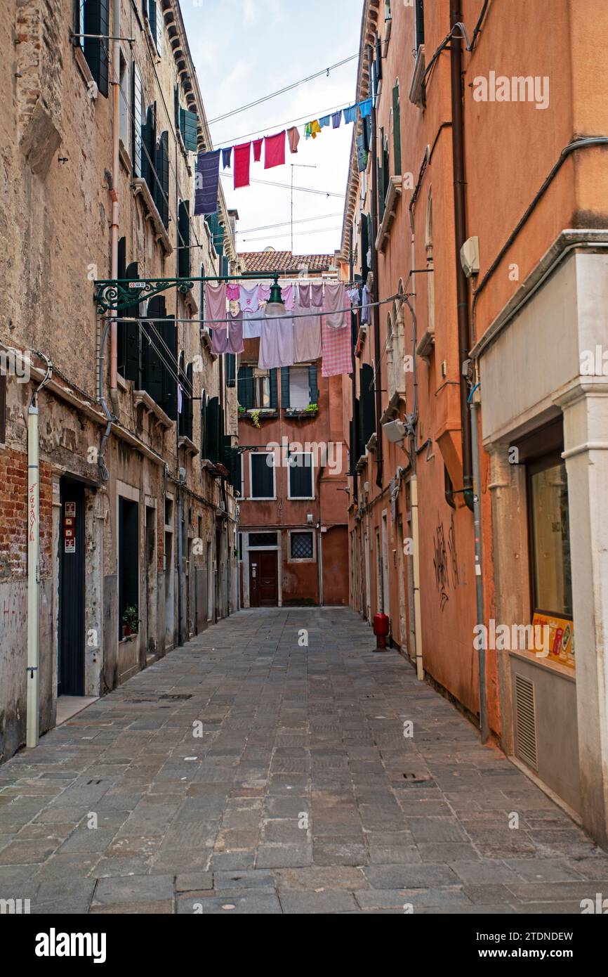 Evening narrow streets of Venice in everyday life. vacation and travel Stock Photo