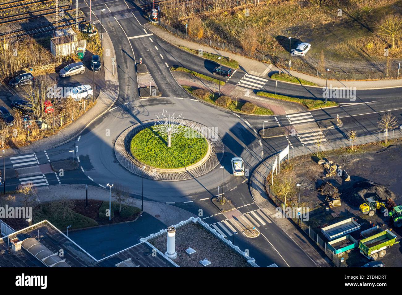 Aerial view, green traffic circle Kleinbahnstraße and Heidestraße, surrounded by autumnal deciduous trees, Hüsten, Arnsberg, Sauerland, North Rhine-We Stock Photo