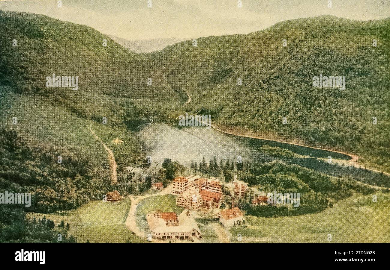 Dixville Notch and Lake Glorietta, New Hampshire, from the book A wonderland of the East, comprising the lake and mountain region of New England and eastern New York; a book for those who love to wander among beautiful lakes and rivers, valleys and mountains, or in places made famous by historic men and events; to which is added an afterword on the worth-while in this wonderland of the East, with some suggestions to motor-tourists on how best to find it by Kitchin, William Copeman. Publication date 1920 Publisher: The Page company Stock Photo