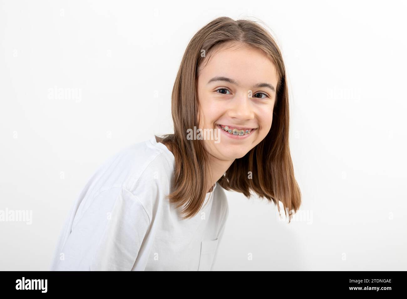 Caucasian teenage girl smiling on a white background isolated Stock ...