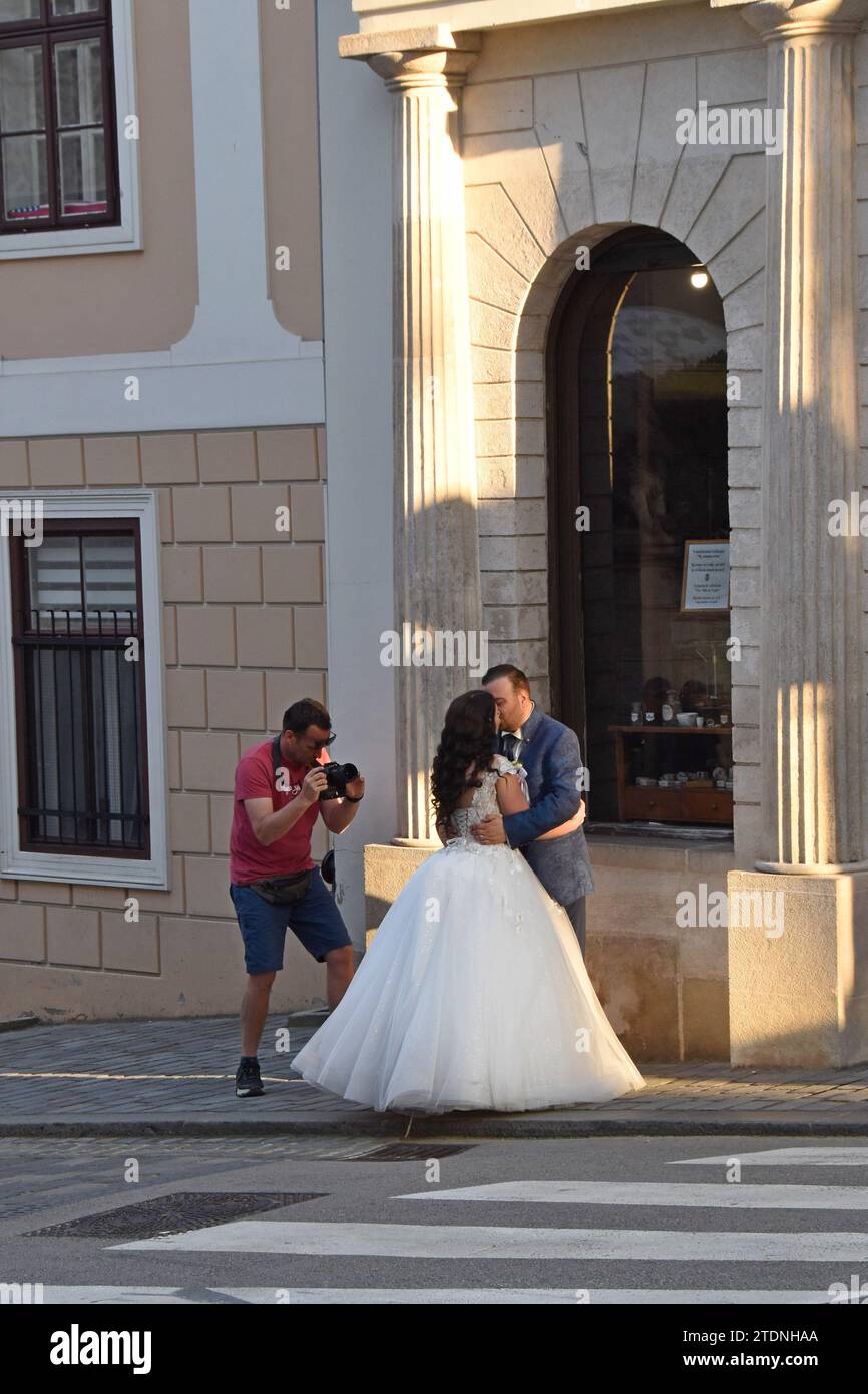 A couple having wedding photos taken in the old town, Zagreb, Croatia Stock Photo