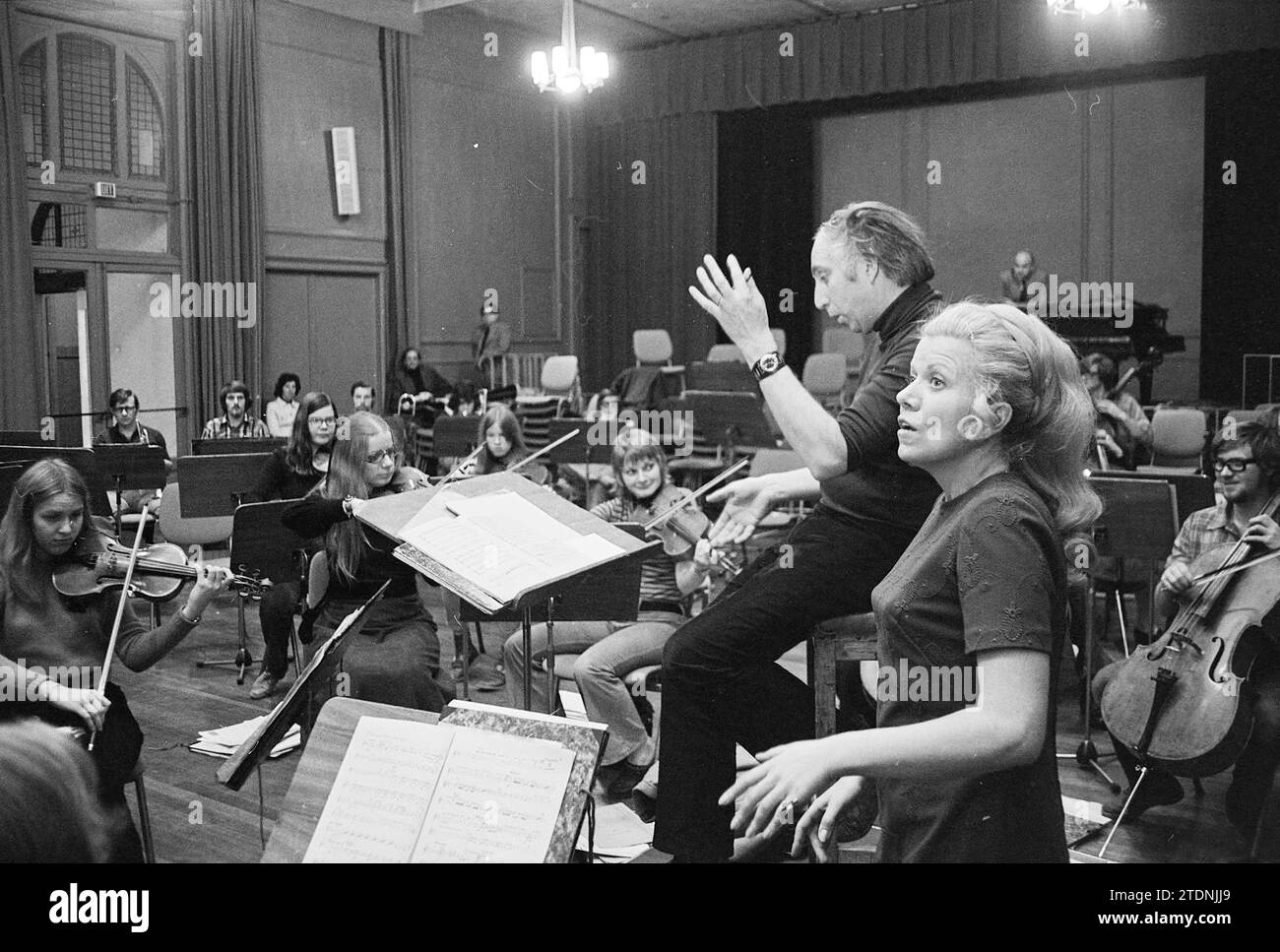 The Turkish soprano Suna Korat rehearses with the Haarlem Youth Orchestra, conducted by André Kaart., Music, Haarlem, The Netherlands, 30-09-1972, Whizgle News from the Past, Tailored for the Future. Explore historical narratives, Dutch The Netherlands agency image with a modern perspective, bridging the gap between yesterday's events and tomorrow's insights. A timeless journey shaping the stories that shape our future Stock Photo