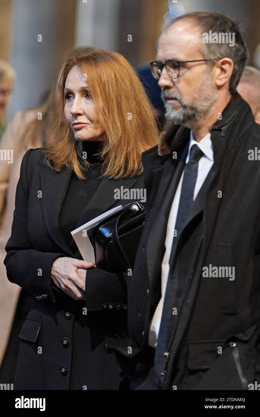 JK Rowling and her husband Neil Murray the memorial service of his father Alistair Darling at Edinburgh's St Mary's Episcopal Cathedral. The former chancellor of the exchequer died on November 30, aged 70, following a stay in hospital where he was being treated for cancer. Picture date: Tuesday December 19, 2023. Stock Photo