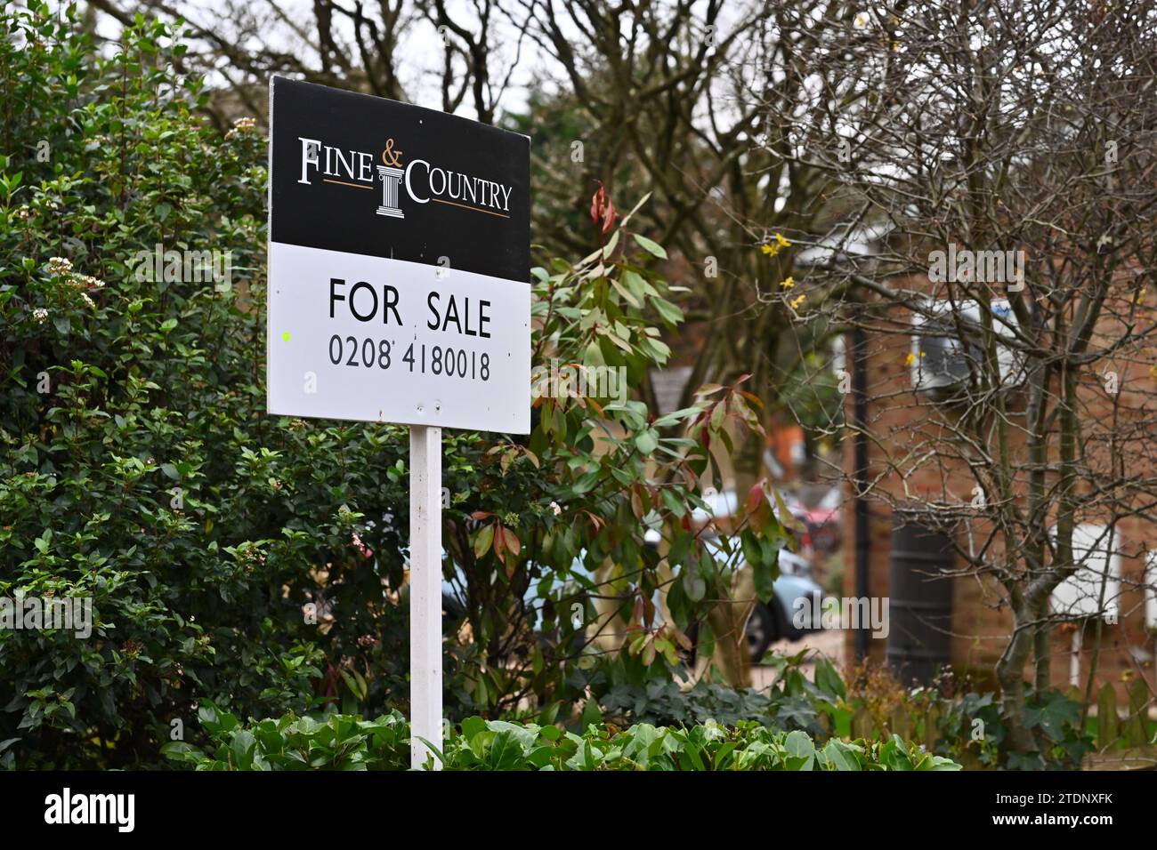 Estate agent's for sale signs in Bukchurst Hill, Essex, England, UK