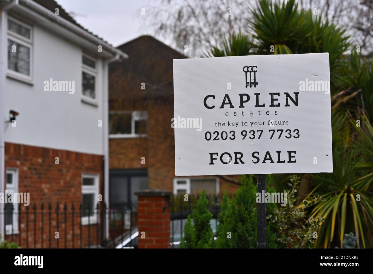Estate agent's for sale signs in Bukchurst Hill, Essex, England, UK