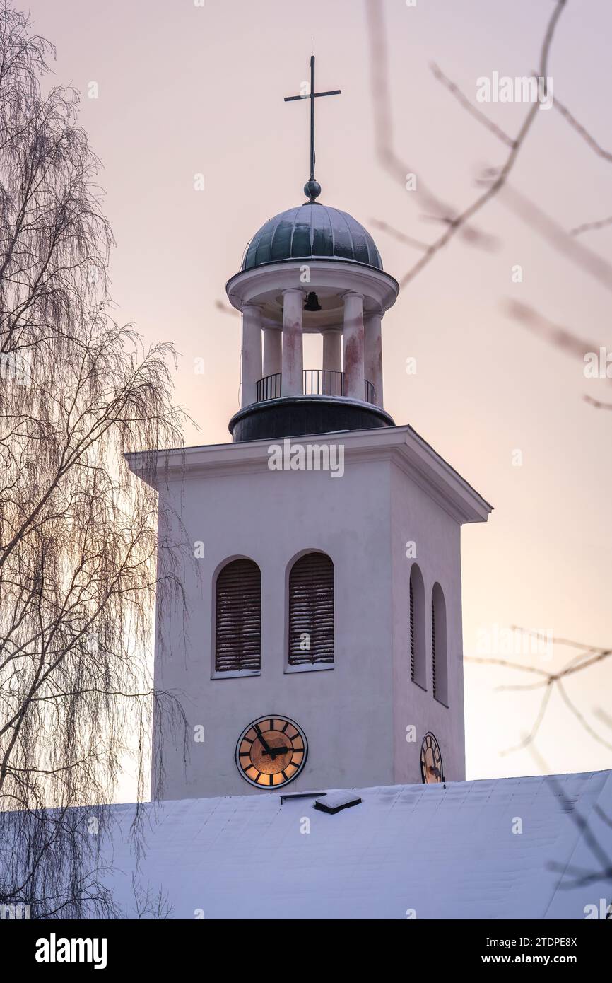 Bell tower of the church in dawn. Orimattila, Finland. December 03, 2023. Stock Photo