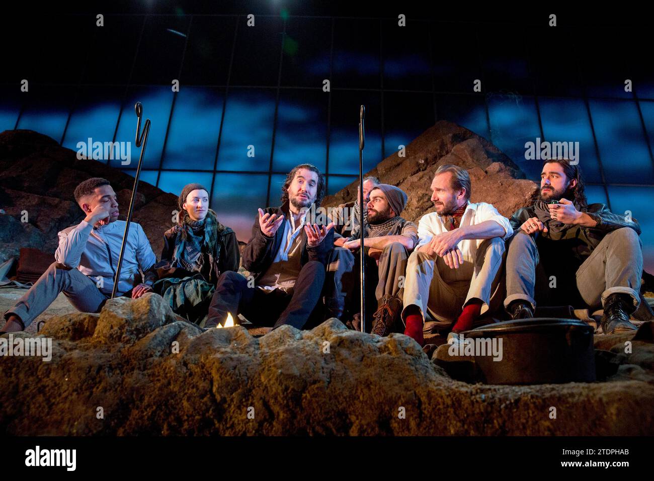 bandit country - l-r: Elliot Barnes-Worrell (Straker), Naomi Cranston (The Sulky Social Democrat)), Tim McMullan (Mendoza), (rear) Colin Haigh (The Anarchist), Arthur Wilson (The Sulky Social Democrat), Ralph Fiennes (Jack Tanner), Nicholas Bishop (The Frenchman) in MAN AND SUPERMAN by Bernard Shaw at the Lyttelton Theatre, National Theatre (NT), London SE1  25/02/2015      design: Christopher Oram  lighting: James Farncombe  director: Simon Godwin Stock Photo