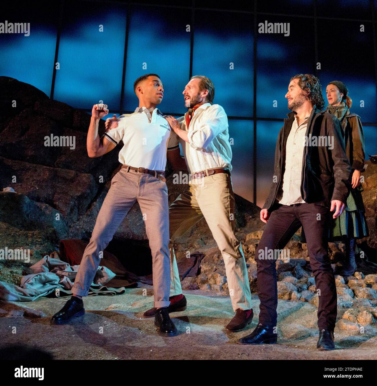 bandit country - front, l-r: Elliot Barnes-Worrell (Straker), Ralph Fiennes (Jack Tanner), Tim McMullan (Mendoza) in MAN AND SUPERMAN by Bernard Shaw at the Lyttelton Theatre, National Theatre (NT), London SE1  25/02/2015      design: Christopher Oram  lighting: James Farncombe  director: Simon Godwin Stock Photo