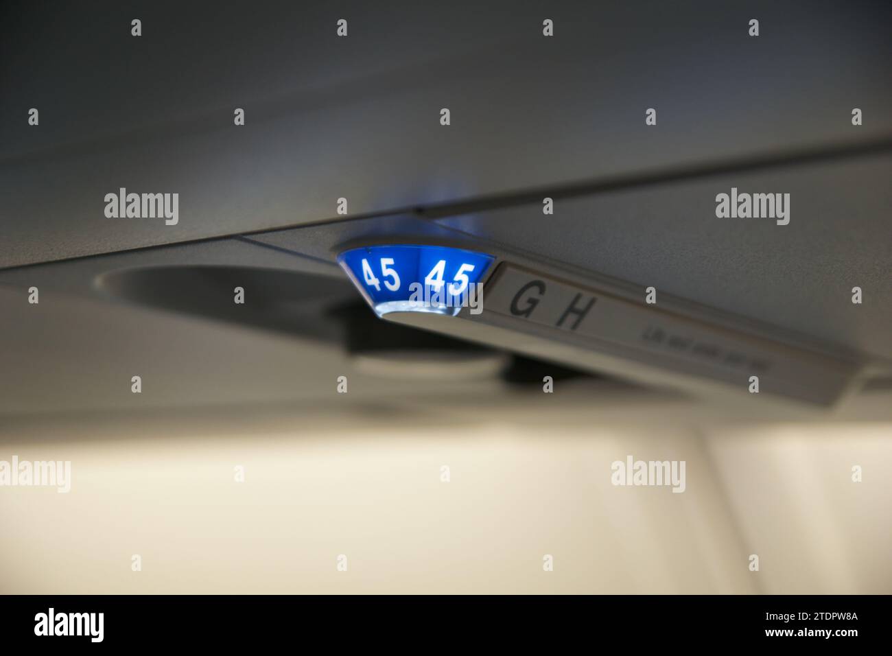 COPENHAGEN, DENMARK - NOV 24, 2018: Close-up of a seat number display in the aircraft cabin in Economy Class on a long-haul flight to San Francisco Stock Photo