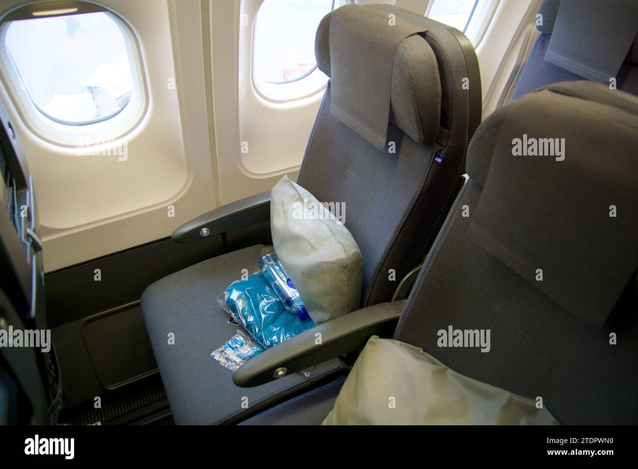COPENHAGEN, DENMARK - NOV 24, 2018: Seat in the aircraft cabin in Economy Class on a long-haul flight to San Francisco Stock Photo