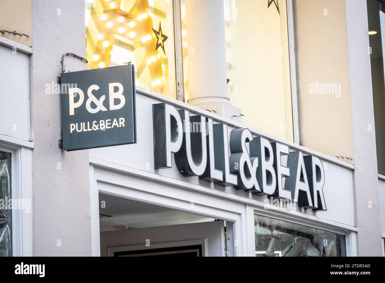 LONDON DECEMBER 14, 2023 Pull & Bear store, a Spanish clothing and accessories retailer Stock