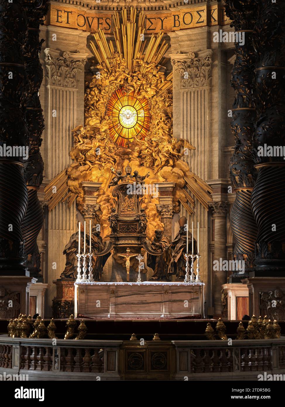 Dove, symbol of the Holy Spirit, over the cathedra Petri (chair of St Peter) in the apse of St Peter's basilica, Rome, Vatican, Italy. Stock Photo