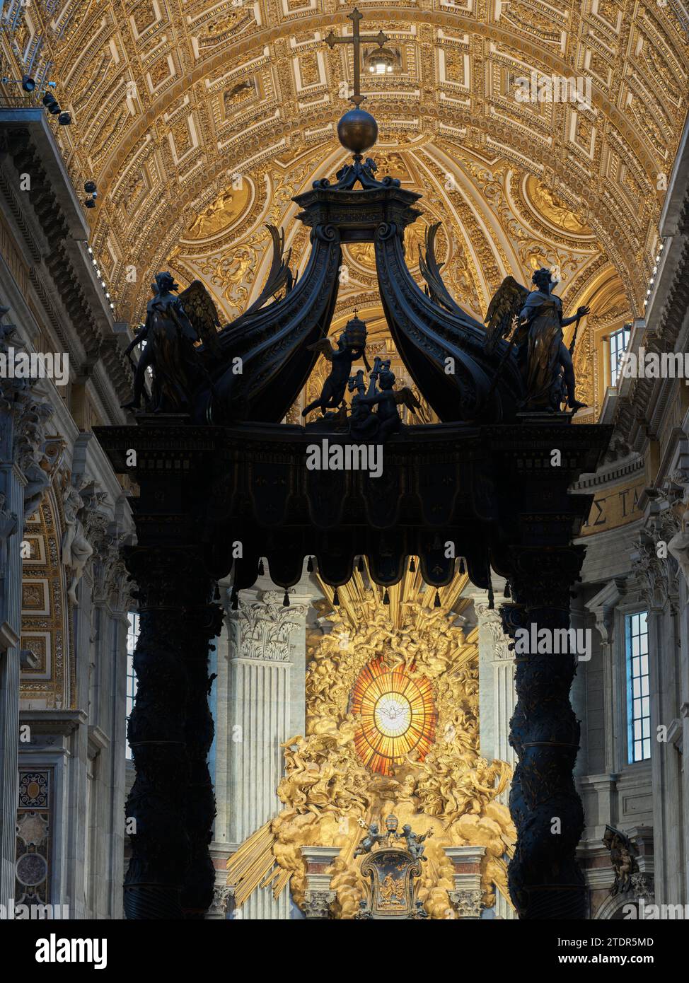 Dove, symbol of the Holy Spirit, over the cathedra Petri (chair of St Peter) in the apse of St Peter's basilica, Rome, Vatican, Italy. Stock Photo