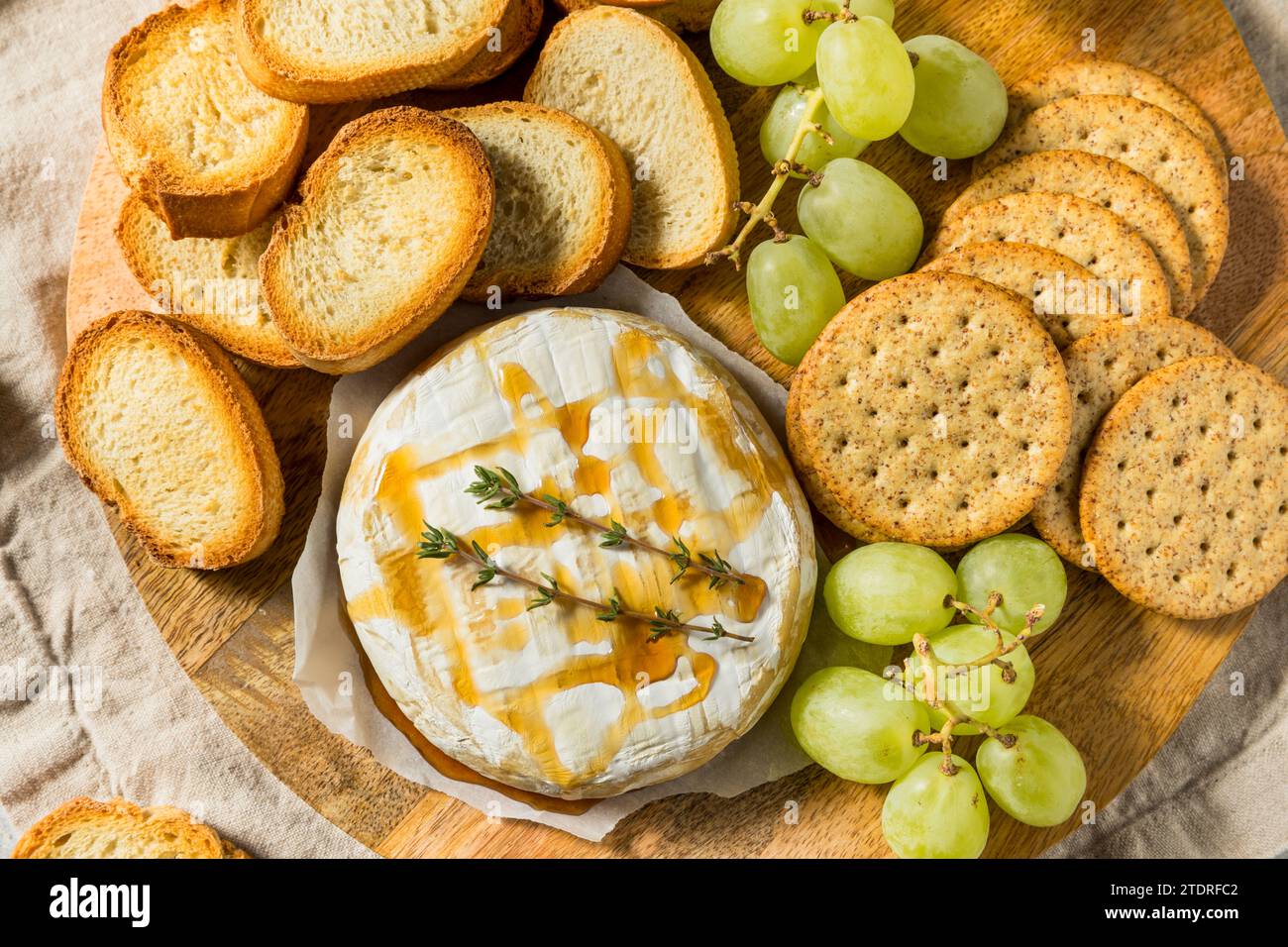 Homemade Baked Brie Appetizer with Grapes and Crackers Stock Photo Alamy