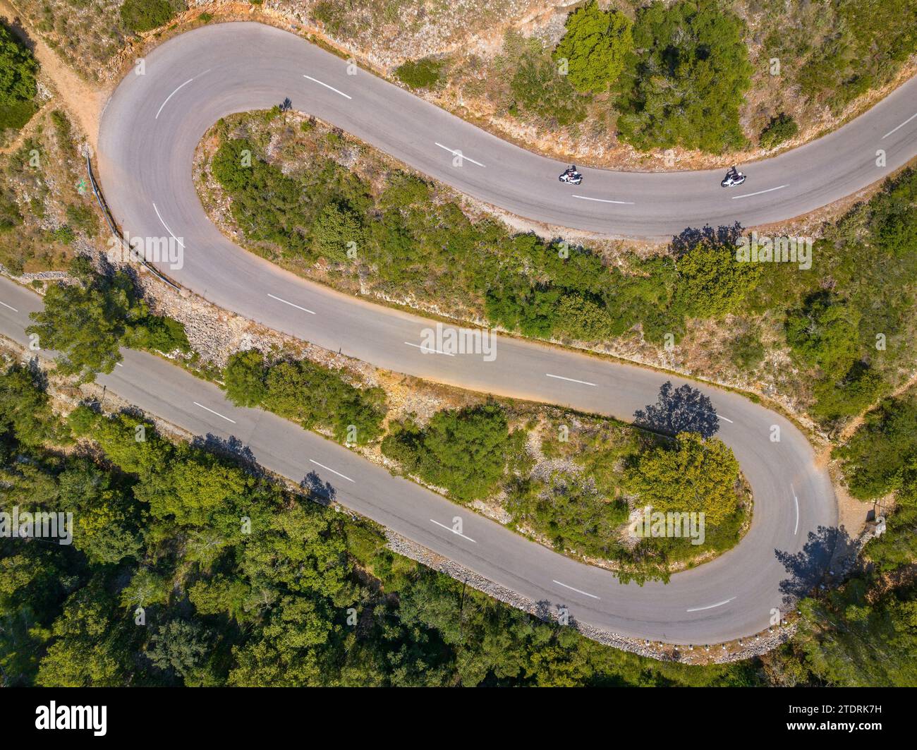 Aerial view of the curves of the road that goes up to the summit of Puig de Randa (Mallorca, Balearic Islands, Spain) Stock Photo
