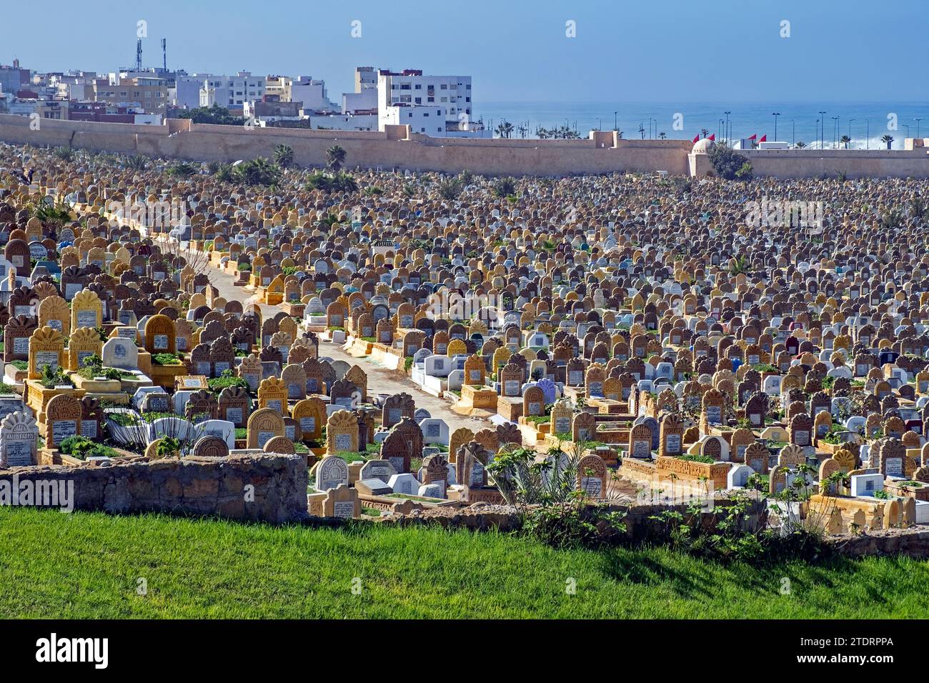 Islamic graves with headstones at the Laalou muslim cemetery with view on the Atlantic Ocean in the city Rabat, Rabat-Salé-Kénitra, Morocco Stock Photo