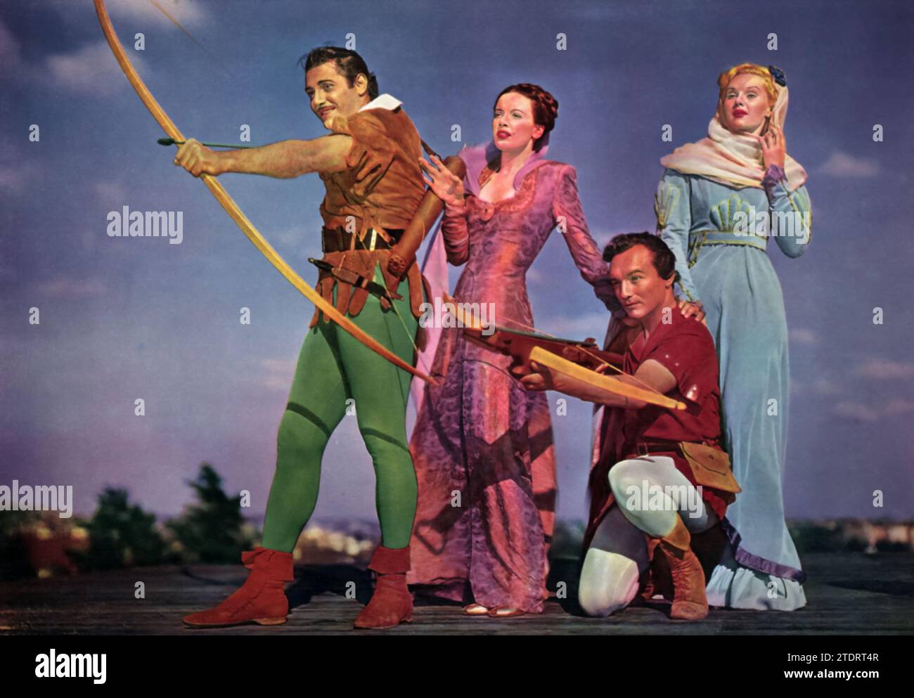 Jon Hall, Patricia Morison, Michael Duane, and Adele Jergens star in 'Prince of Thieves' (1948), an adventure film based on the Robin Hood legends. Hall takes on the role of the charming outlaw Robin Hood, with Morison as Lady Marian, his love interest. Duane plays Allan-a-Dale, a loyal ally, while Jergens portrays Lady Christabel, adding intrigue to the story. Set in medieval England, the film brings to life the classic tale of Robin Hood's fight against injustice, showcasing the heroics, romance, and camaraderie that have made the story timeless. Stock Photo