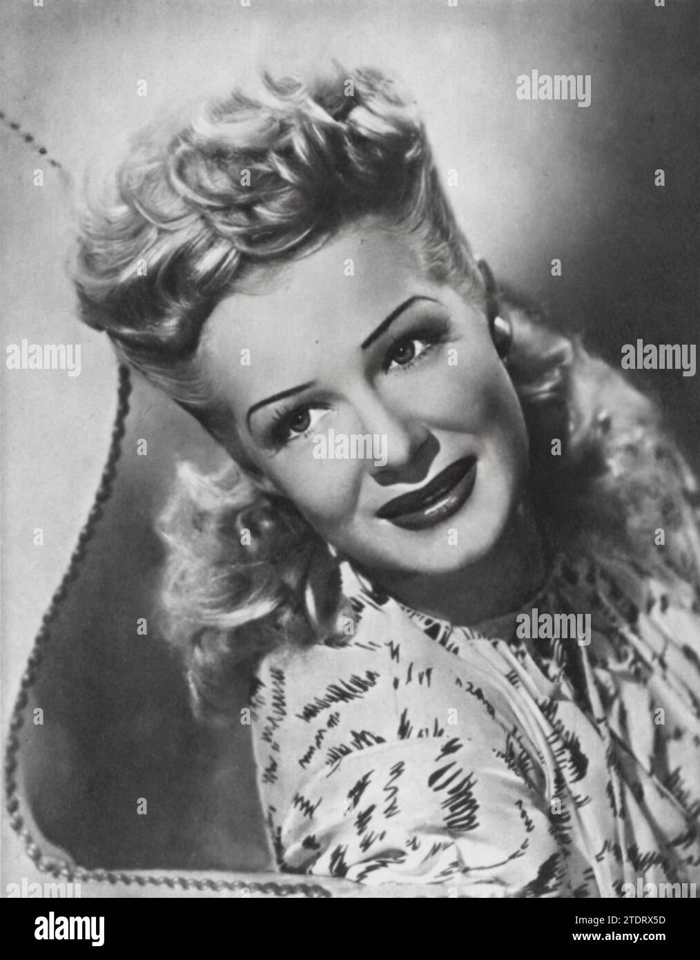 Betty Hutton (born February 26, 1921 - died March 12, 2007) starred in 'The Perils of Pauline' (1947), a biographical musical that humorously chronicles the life of silent film star Pearl White. Hutton's portrayal of White was both vibrant and captivating, showcasing her talents in a role that mirrored the dynamic and ambitious spirit of her character. Stock Photo