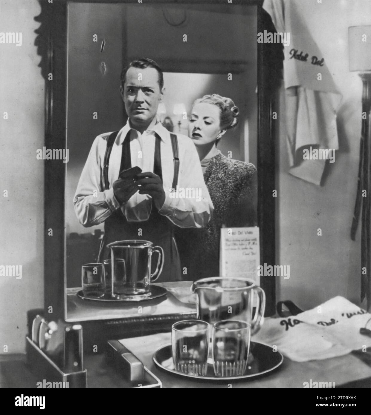 Robert Montgomery and Audrey Totter are featured in the film 'Lady in the Lake' (1947). This noir thriller is distinctive for its use of first-person camera perspective, immersing viewers directly into the unfolding mystery. Montgomery not only takes the lead role but also steps behind the camera as the director, adding a unique touch to the film's storytelling. Stock Photo