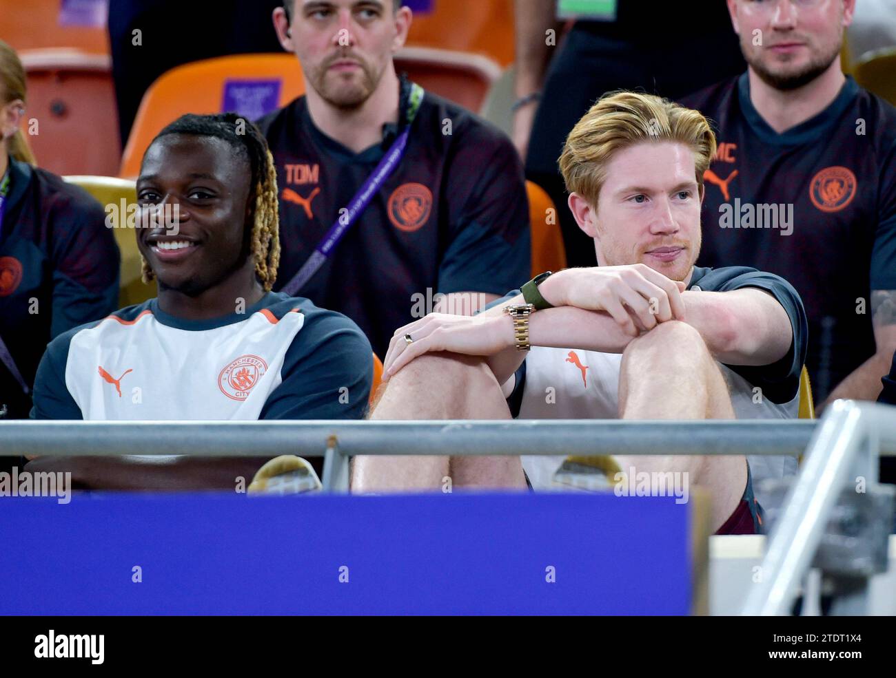 Manchester City's Kevin De Bruyne (right) and Jeremy Doku in the stands during the FIFA World Cup Club Saudi Arabia 2023 semi-final match at the King Abdullah Sports City Stadium, Jeddah. Picture date: Tuesday December 19, 2023. Stock Photo