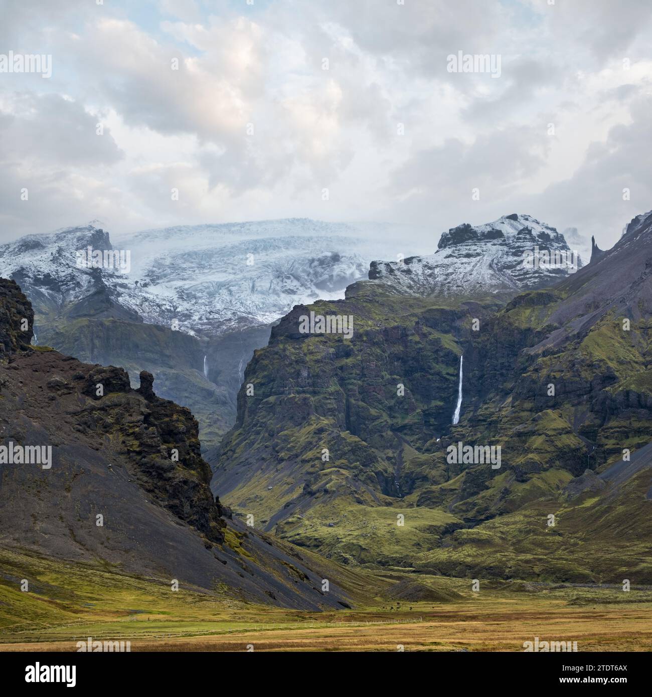 View from highway to Mulagljufur Canyon during auto trip in Iceland. Spectacular Icelandic landscape with  scenic nature: mountains, fjords, glaciers, Stock Photo