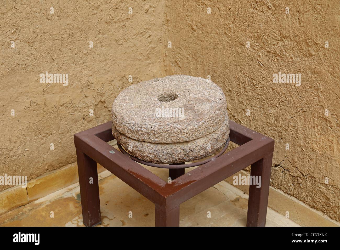 Grinding stones displayed in the museum at Masmak Fortress Stock Photo