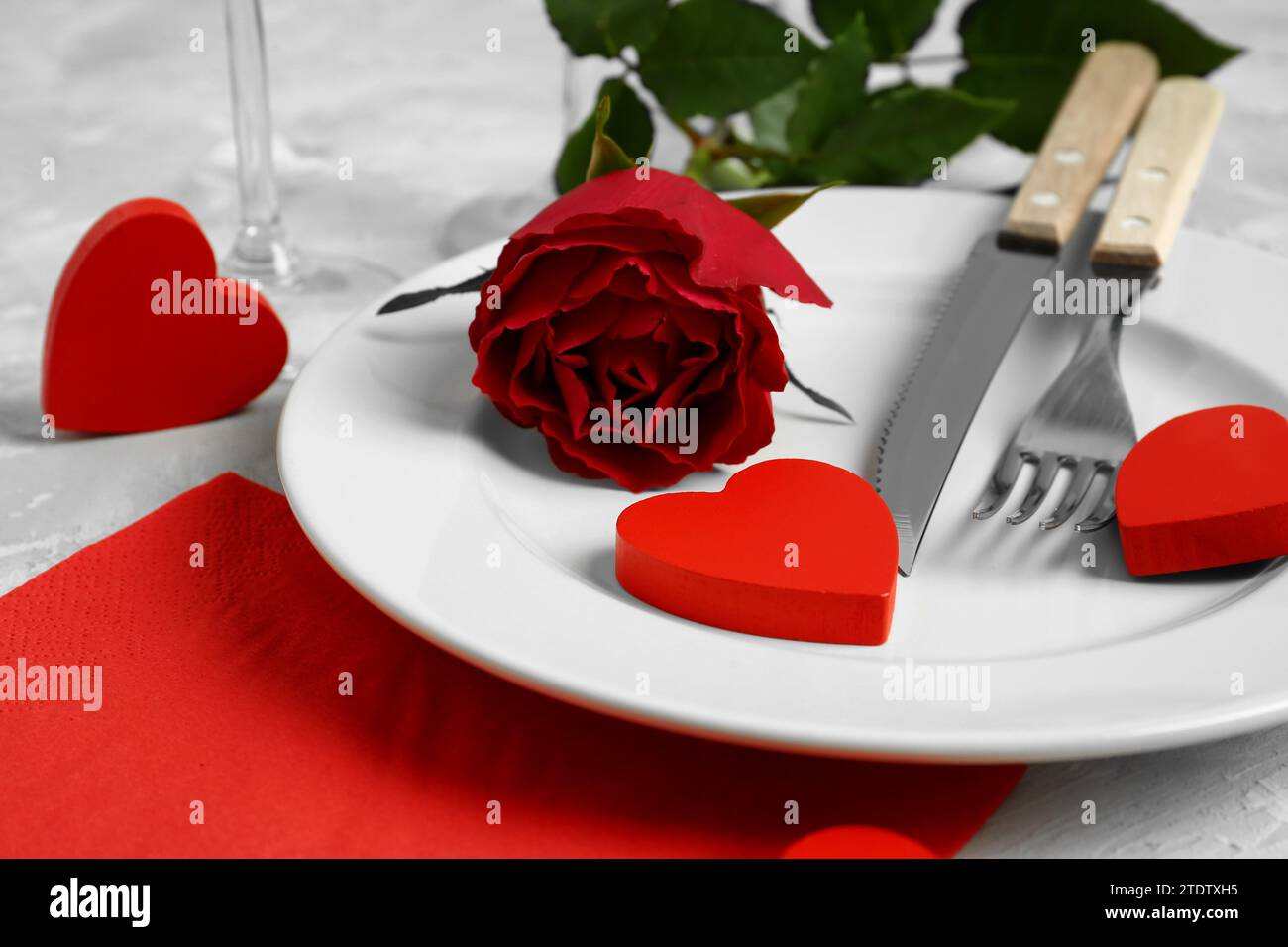 Beautiful table setting for Valentine's Day with red rose and decor on ...