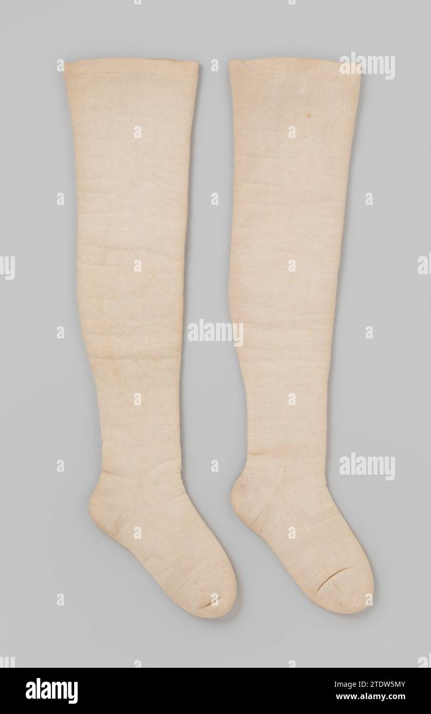 Stockings of solid cream -colored cotton, lined with unpesponsed wool, c. 1780 Stockings of solid cream -colored cotton, lined with unpesponsed wool. Seam in the middle. Bold initials on the upper edge: YV (?). Netherlands whole: Cotton (textile). Lining: Wool knitting Stockings of solid cream -colored cotton, lined with unpesponsed wool. Seam in the middle. Bold initials on the upper edge: YV (?). Netherlands whole: Cotton (textile). Lining: Wool knitting Stock Photo