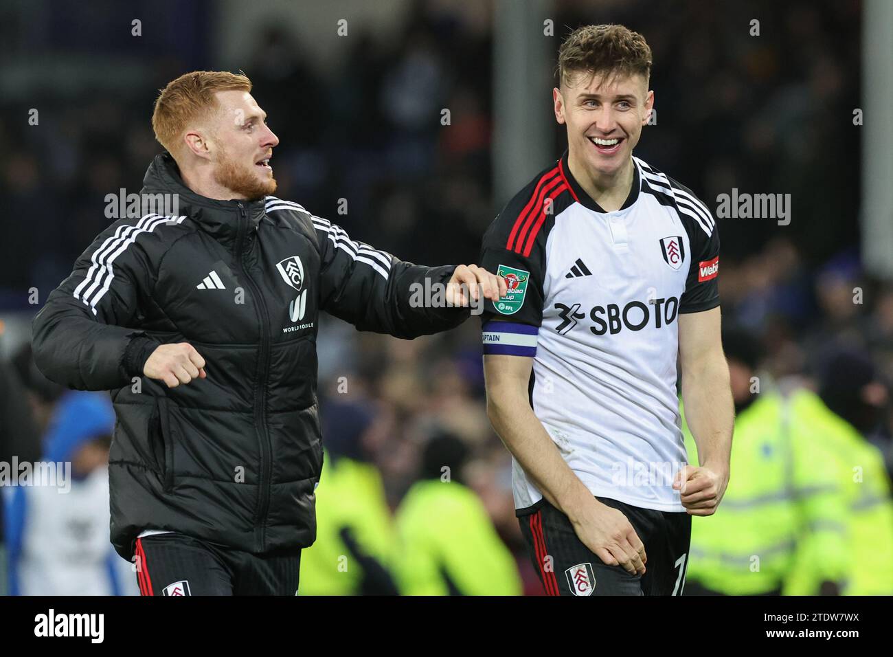 Harrison Reed of Fulham and Tom Cairney of Fulham celebrate their teams win after the Carabao Cup Quarter Final match Everton vs Fulham at Goodison Park, Liverpool, United Kingdom, 19th December 2023  (Photo by Mark Cosgrove/News Images) Stock Photo